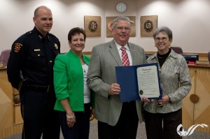 Photo courtesy the City of College Station (L-R) CSPD Police Chief Jeff Capps, Dee Ann Schneider, Elmer Schneider, and Mayor Nancy Berry.