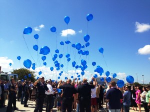 Bachmann Balloon Memorial attendees release their balloons at Brian Bachmann Park