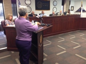 Margaret Munoz addressing the Brazos County Commission.