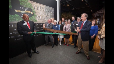 Photo from @txforestserv Twitter feed at the grand opening of the Bush Library and Museum exhibit.
