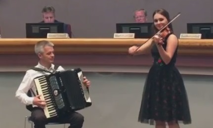Screen shot from the city of Bryan Facebook page of (L-R) accordionist Zgymunt Czupryn and violinist/vocalist Ania Adamowska of Tekla Klebetnica.
