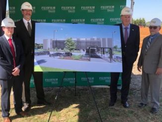 FUJIFILM Diosynth Biotechnologies officials around the architect's rendering at the groundbreaking of the Advanced Therapies Innovation Center on August 19, 2020. (L-R) : Michael Baker, Head of Process Development, Thomas Page, PhD, VP Engineering and Asset Development, Gerry Farrell, PhD, Chief Operating Officer, and Steven Pincus, PhD, Head of Science and Innovation.