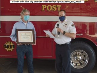 Screen shot showing (L-R) Roger Garrett and fire chief Randy McGregor from a video produced by the city of Bryan at https://youtu.be/vp_mv_-HyJo.