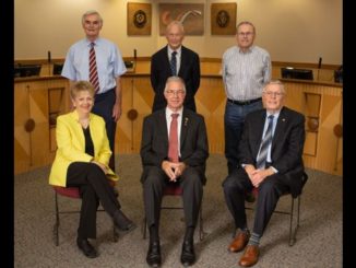 City of College Station photo of the current city council. Standing (L-R): John Crompton, Bob Brick, and Dennis Maloney. Sitting (L-R): Linda Harvell, Mayor Karl Mooney, and John Nichols.