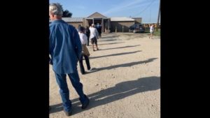 Photo courtesy of a WTAW listener showing the line of voters outside Bryan's Arena Hall the morning of October 13, 2020.