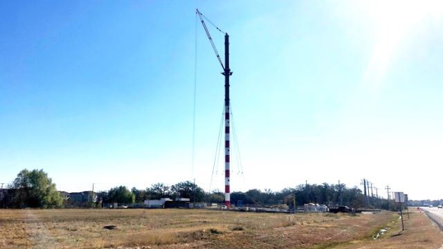 The "candy cane" decorated crane at the construction site of the city of College Station's new water tower, December 4 2020.