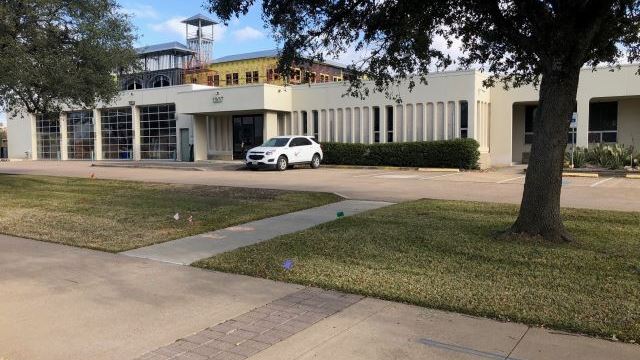 The former College Station central fire department station, and in the background the new city hall under construction, January 18, 2021.