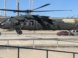 One of two Black Hawk helicopters landing in the parking lot of the Brazos Valley Food Bank, February 23 2021.