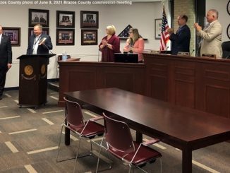 Brazos County photo showing at the podium (L-R) Jim Stewart and Duane Peters.