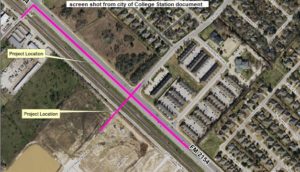 Screen shot from a city of College Station document showing in pink the construction zone of a new railroad crossing at Wellborn Road and Deacon Drive West.