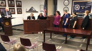 Nurses receiving a proclamation during the April 26, 2022 Brazos County commission meeting.