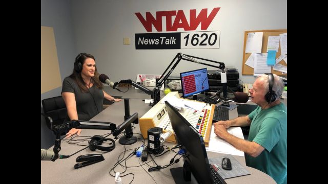 Photo from the city of College Station of (L) city of College Station public works director Emily Fisher and (R) WTAW's Scott DeLucia on May 13, 2022.