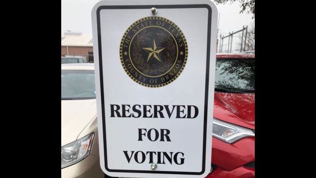 Parking sign in the lot west of the Brazos County elections office, June 1, 2022.