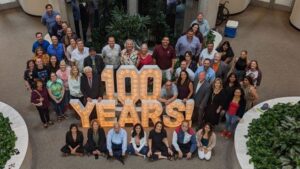 Bryan Broadcasting employees gather to celebrate WTAW's 100th birthday on October 7, 2022.