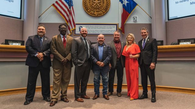 Photo from the city of Bryan of the city council (L-R) single member district (SMD) 1 councilman Paul Torres, SMD 2 councilman Ray Arrington, SMD 3 councilman Jared Salvato, mayor Bobby Gutierrez, SMD 4 councilman James Edge, SMD 5 councilwoman Marca Ewers-Shurtleff, and at large member Kevin Boriskie.