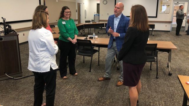 The lone finalist for College Station ISD superintendent, Dr. Tim Harkrider, visits with CSISD central office staff following the June 12, 2023 CSISD school board meeting.