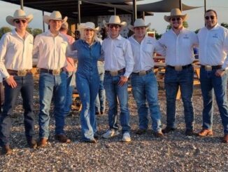 Photo courtesy of the Chilifest music festival with members of the Chilifest board and (third from left) Bryan Broadcasting's Corliss.