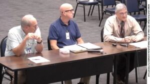Screen shot of (L-R) Bryan ISD maintenance director Ron Clary, assistant director of safety & security Rich Himmel, and assistant superintendent Kevin Beesaw from a Bryan ISD video at https://www.youtube.com/watch?v=7ZZnETJIu4I