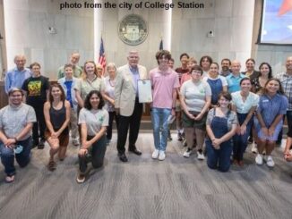 Photo from the city of College Station showing those accepting the "Light Out Nights" proclamation during the August 10, 2023 city council meeting.