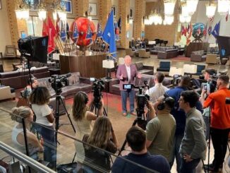 Texas A&M interim president Mark Welsh visiting with reporters in the memorial student center flag room, August 2, 2023.