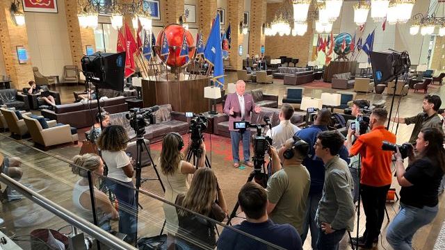 Texas A&M interim president Mark Welsh visiting with reporters in the memorial student center flag room, August 2, 2023.