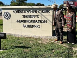 Retired Brazos County sheriff Chris Kirk and his wife Sheryl at the dedication of the signage for the Christopher C. Kirk sheriff's administration building on October 9, 2023.