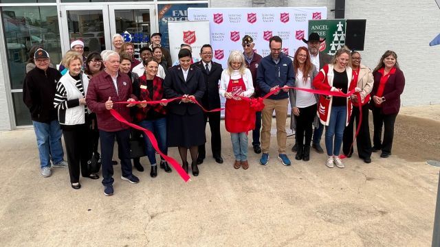 Participants at the ribbon cutting of the launch of the B/CS Salvation Army holiday campaign, November 10, 2023.