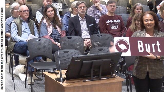 Screen shot from the city of College Station's archived video of Barbara Moore showing a new street sign in the historic Southside neighborhood during the February 8, 2024 city council meeting.