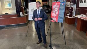 Texas state comptroller Glenn Hegar visiting with reporters inside the George H.W. Bush museum, March 26, 2024.