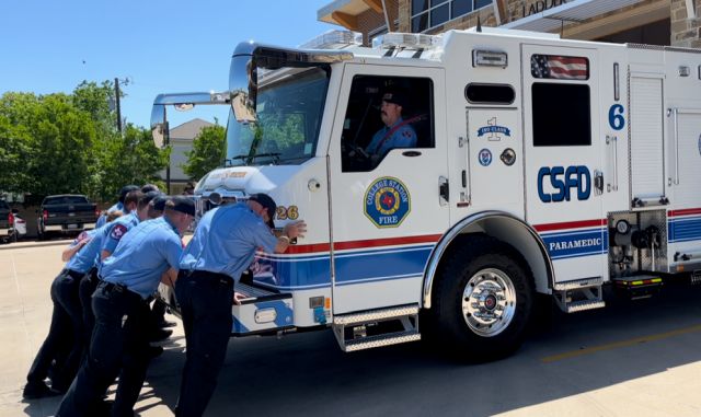 Firefighters from College Station fire department station six participating in the "push-in" ceremony of a new fire engine on April 11, 2024.