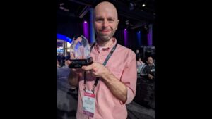 Bryan Broadcasting operations manager and Candy 95 afternoon host Rob Mack holding the National Association of Broadcasters Crystal Award at the NAB Radio Show in Las Vegas on April 16, 2024.
