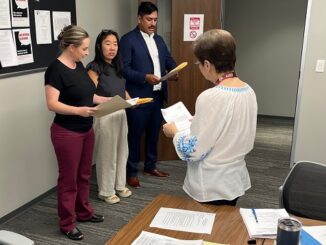 Sworn in August 22, 2024 as new members of the board of the Brazos Central Appraisal District are (L-R) Brazos County's new tax assessor-collector Melissa Leonard and the first elected board members Jane Sherman and Rafael Pena. They were sworn in by BCAD administrative assistant Debbie Lockledge.