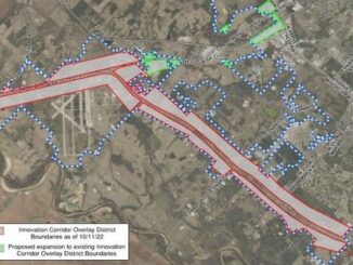 screen shot from a city of Bryan document showing in green, the expanded area of the "innovation corridor" and in red the corridor's original area.