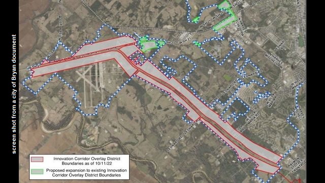 screen shot from a city of Bryan document showing in green, the expanded area of the "innovation corridor" and in red the corridor's original area.