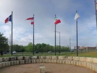 Flags flying at Boonville Cemetery and Heritage Park, March 25, 2019.