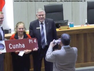 Screen shot of (L-R) College Station city manager Bryan Woods, retired councilwoman Elizabeth Cunha, and mayor John Nichols from https://www.cstx.gov/departments___city_hall/pubcomm/channel_19