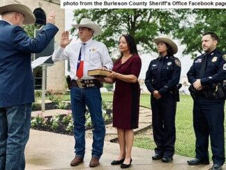 Photo from the Burleson County sheriff's office Facebook page showing (L-R) new sheriff Bill Rios, his wife Irma, daughter Stephanie Goodrich who is with the Harris County sheriff's office, and son Willie Rios who is with the Houston police department.