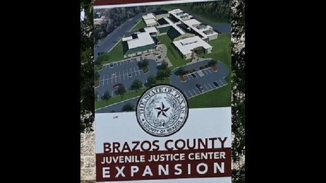 Signage at the groundbreaking of the Brazos County juvenile detention center expansion on June 1, 2018.