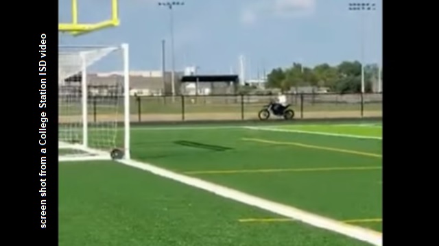 Screen shot from a College Station ISD video of a dirt bike on a new middle school track.